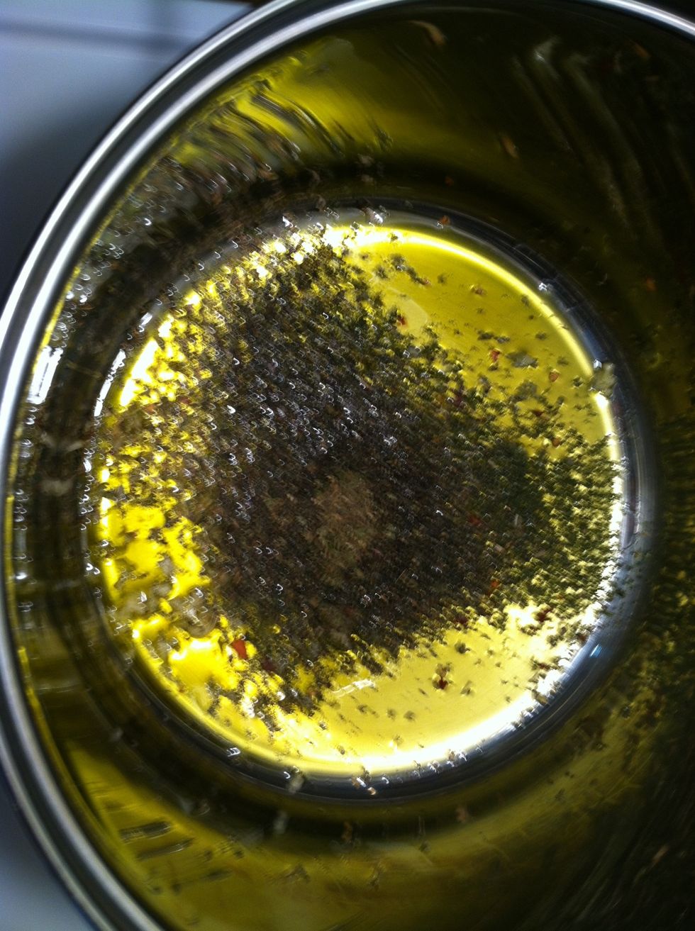 Add parsley, crushed red pepper flakes, oregano and basil.