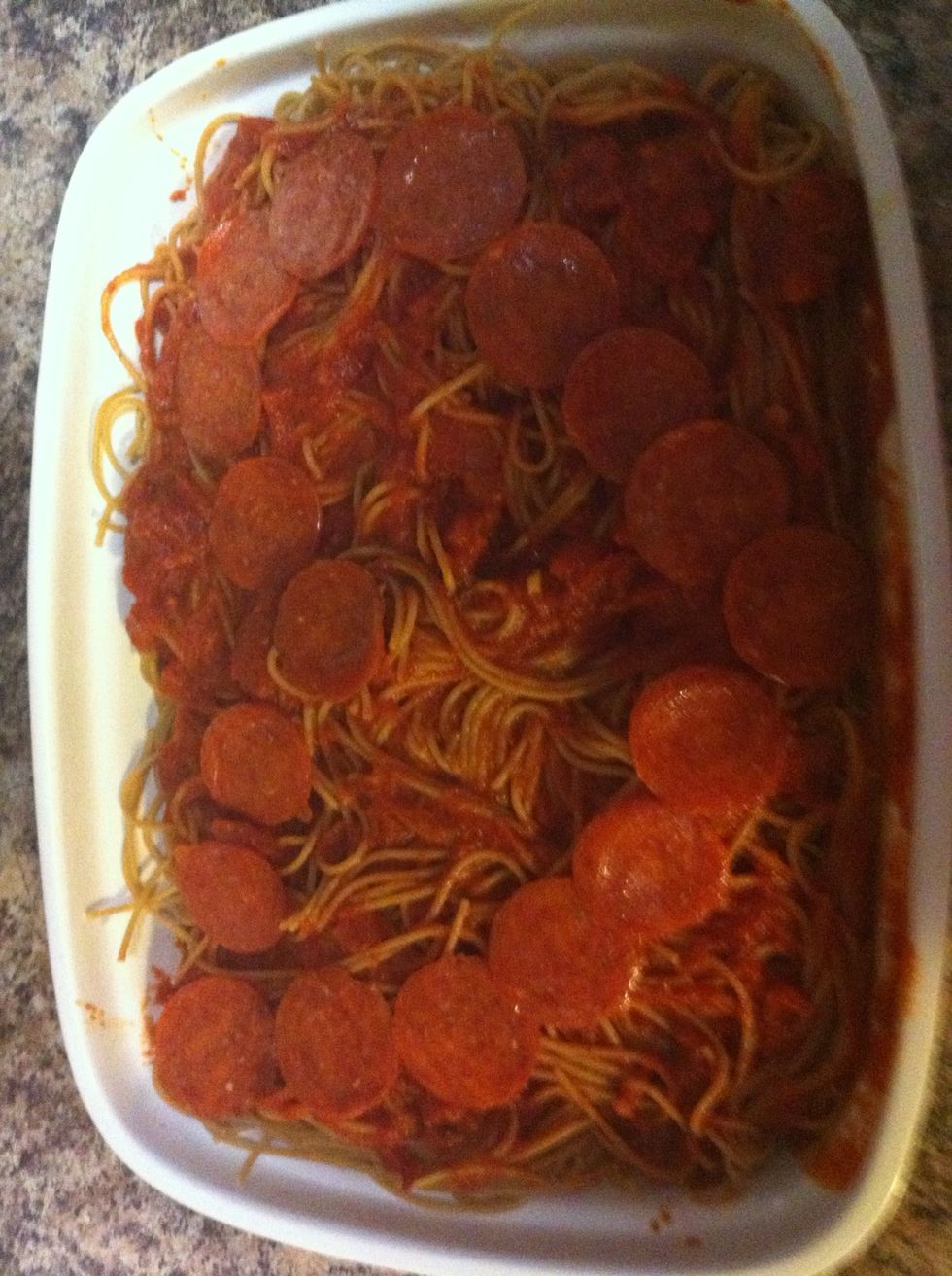 Add pasta/ pizza sauce then pepperoni like before. We ran out of pepperoni so we made a heart shape :-)