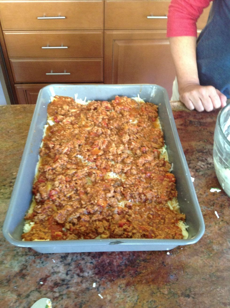 Add Pasta Sauce on top of cheeses