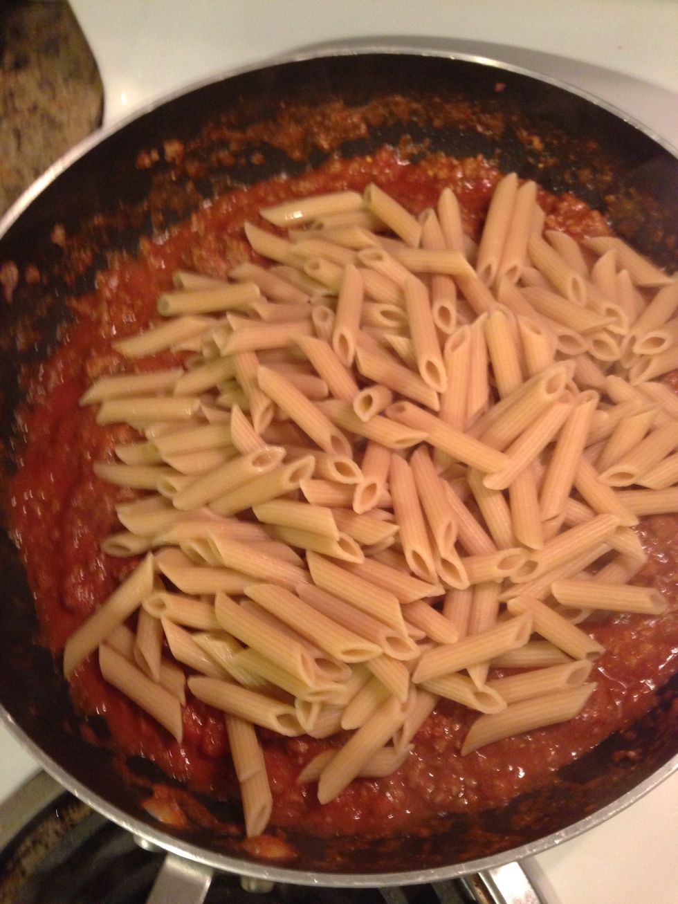 Add pasta to meat and sauce. If your skillet isn't big enough use a big bowl instead.