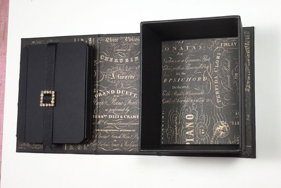 Add pattern paper to the bottom of the box.