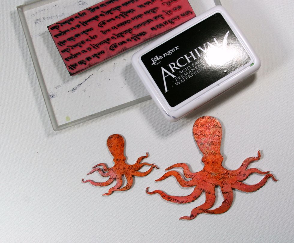 Add pattern to octopuses with a text stamp and Ranger Black Archival Ink.
