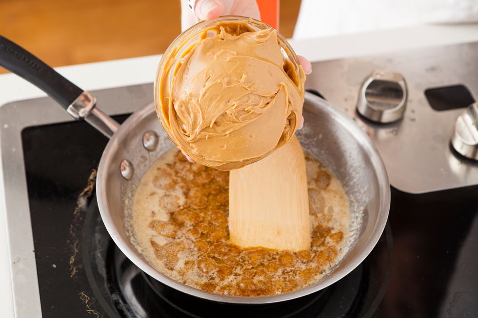 Add peanut butter and mix thoroughly until mixture starts to gently bubble.