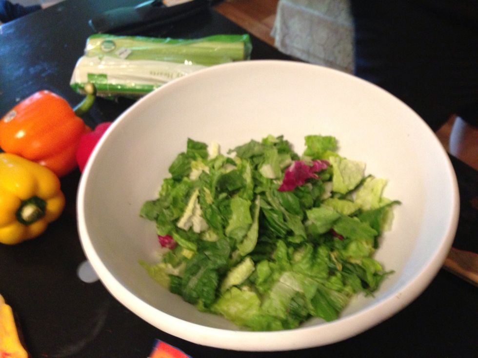 Add peas and lettuce to the bowl in layers