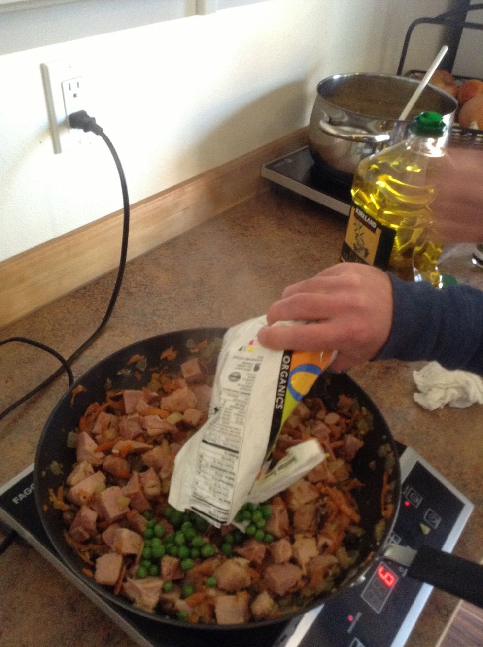 Add peas to skillet