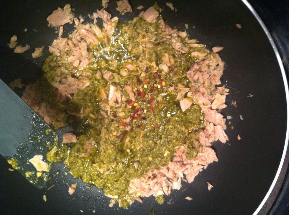 Add pesto and chilli flakes ( add as much flakes as u can handle )