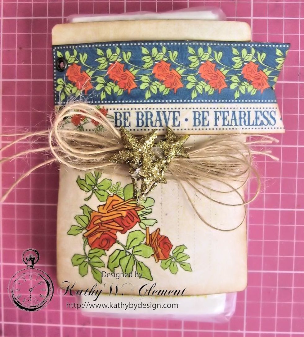 Add Petaloo Star clusters to the top of the burlap string bow and tuck into the prepared pocket.