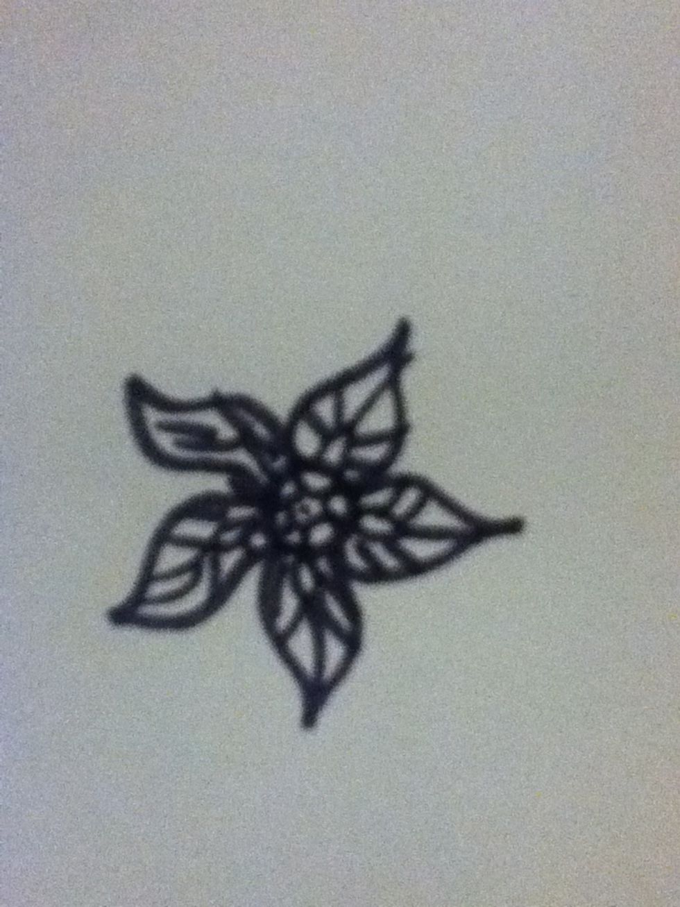 Add petals and decorate inside them too :)
