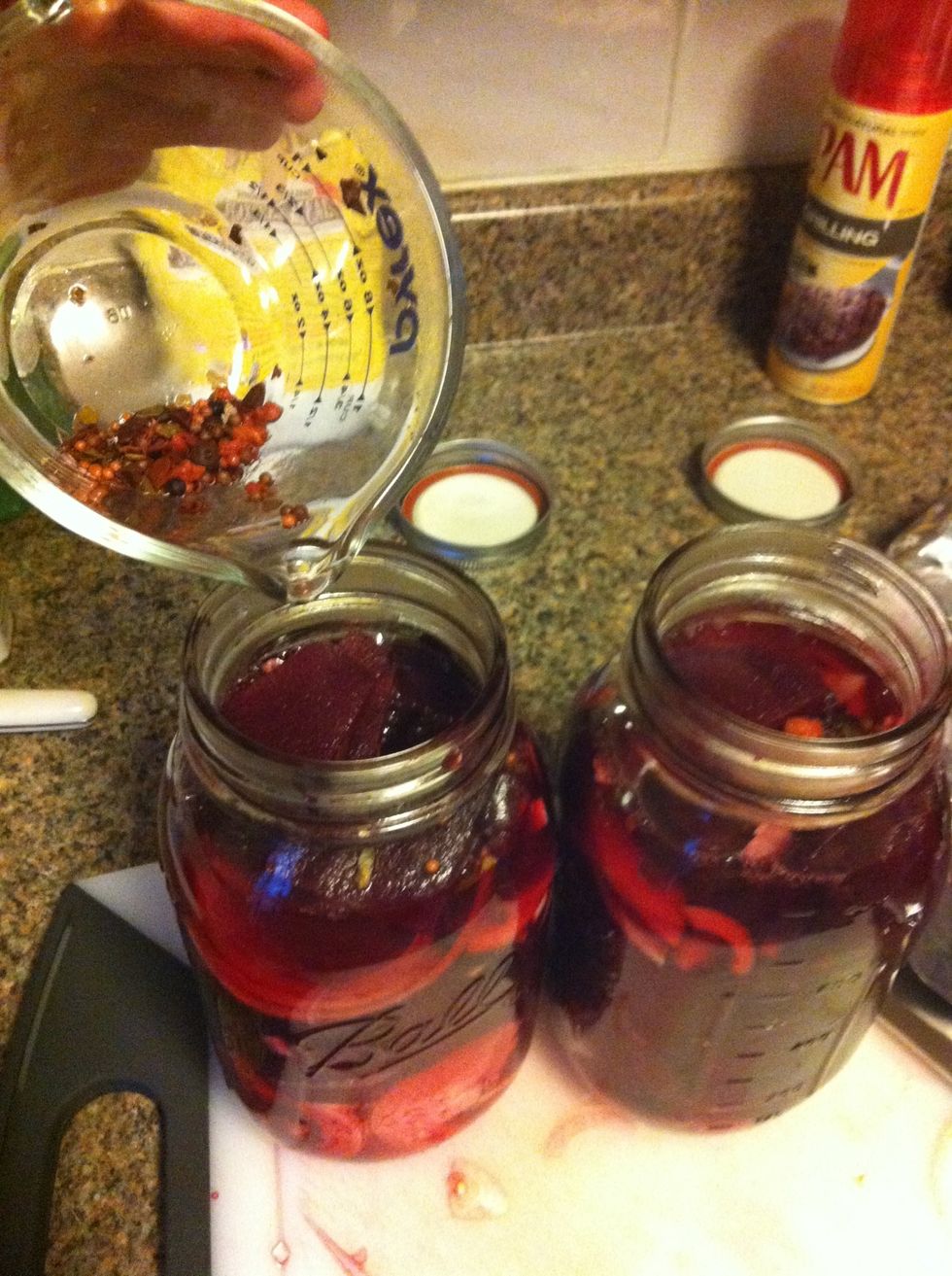 Add pickled beet juice to beets and onions. Get all those spices in!