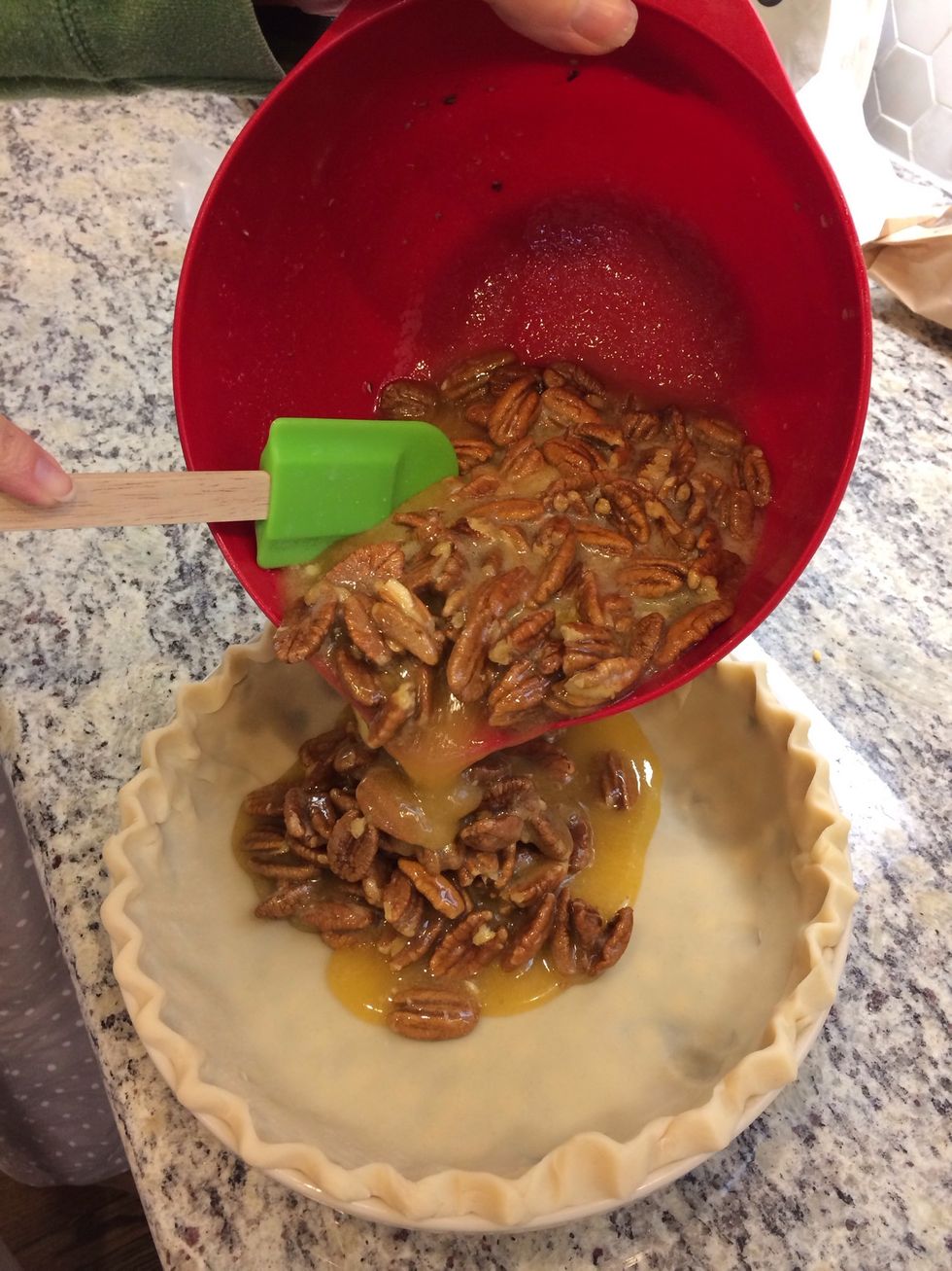 Add pie filling to the unbaked pie crust