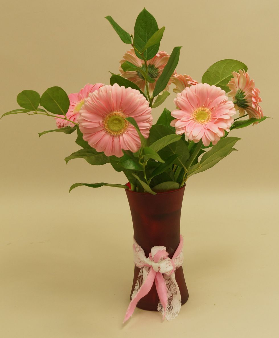 Add pink gerberas.
