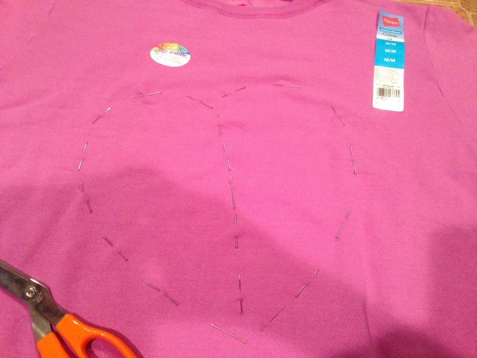 Add pins down the center so you are reminded not to cut past the middle line. That's the spine of the heart.