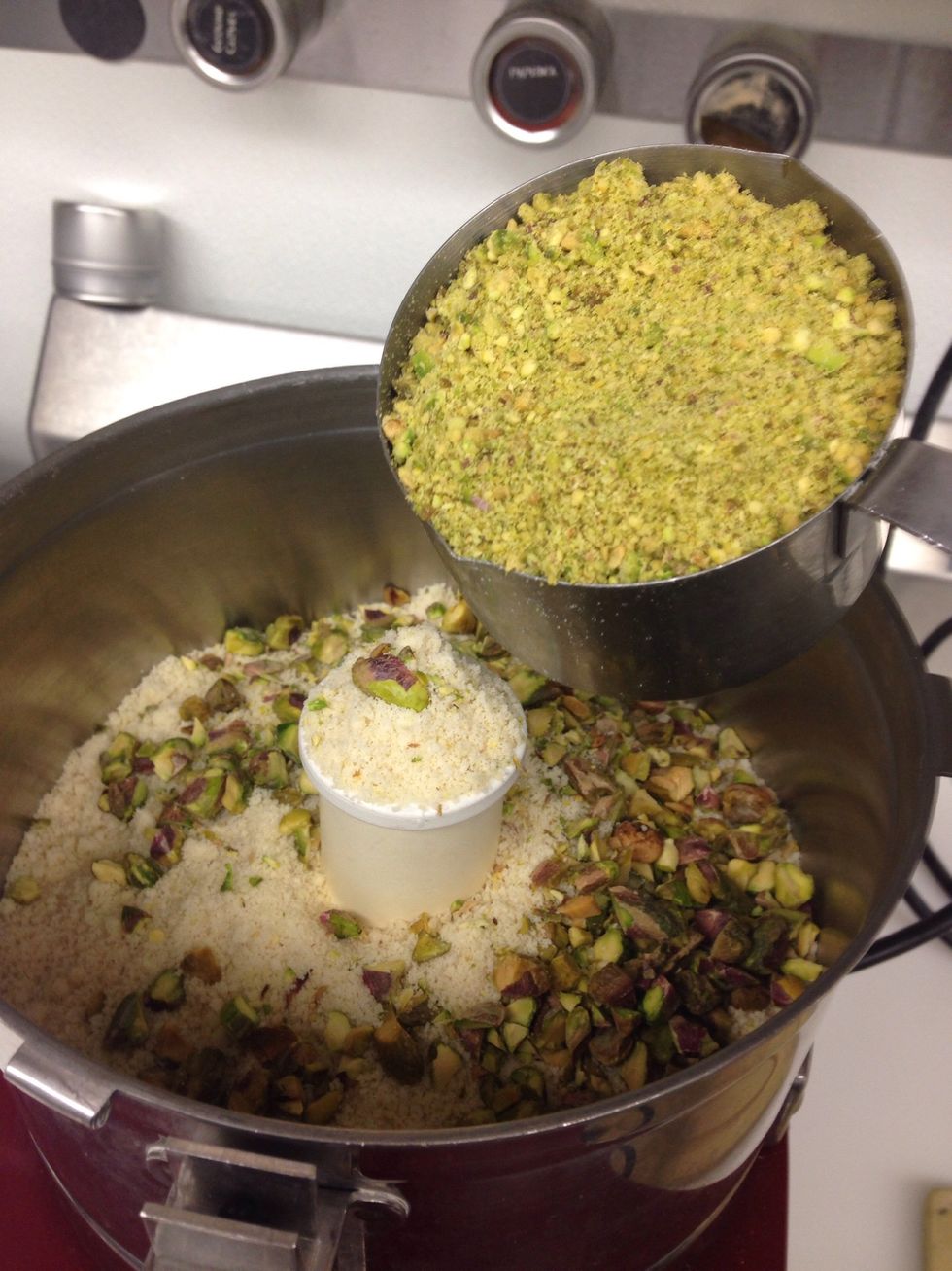 Add pistachio flour. (Vita-mix 1c of pistachios to a fine consistency to get pistachio flour).