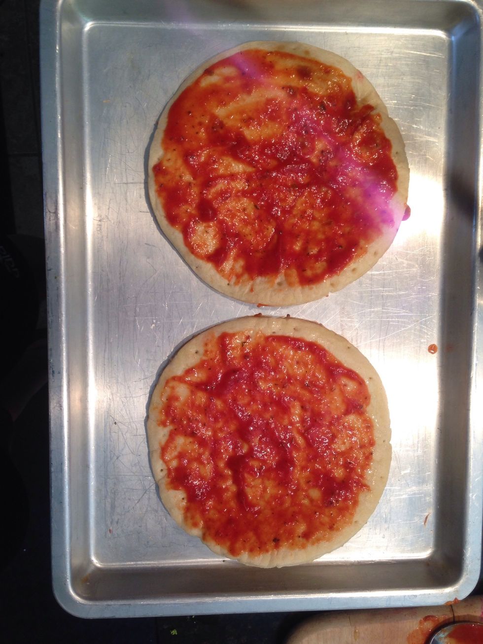 Add pizza sauce. You can also use pesto or Alfredo.