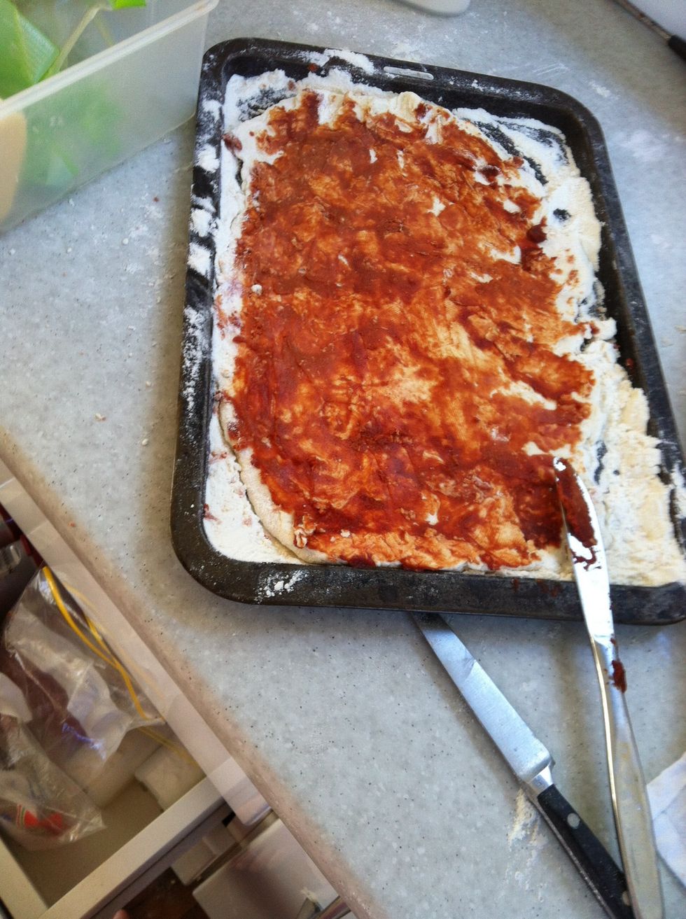 Add pizza sauce
