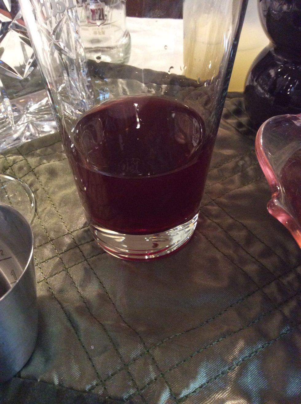 Add Pom juice to the shaker.
