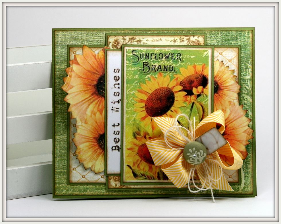 Add poofy bow of Really Reasonable Ribbon Yellow Chevron Striped Twill. Top with bow of Ivory Burlap String, fabric covered brad and small tag.