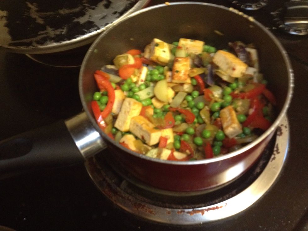 Add potato mixture with tofu and peppers. Cook for a few minutes adding more olive oil
