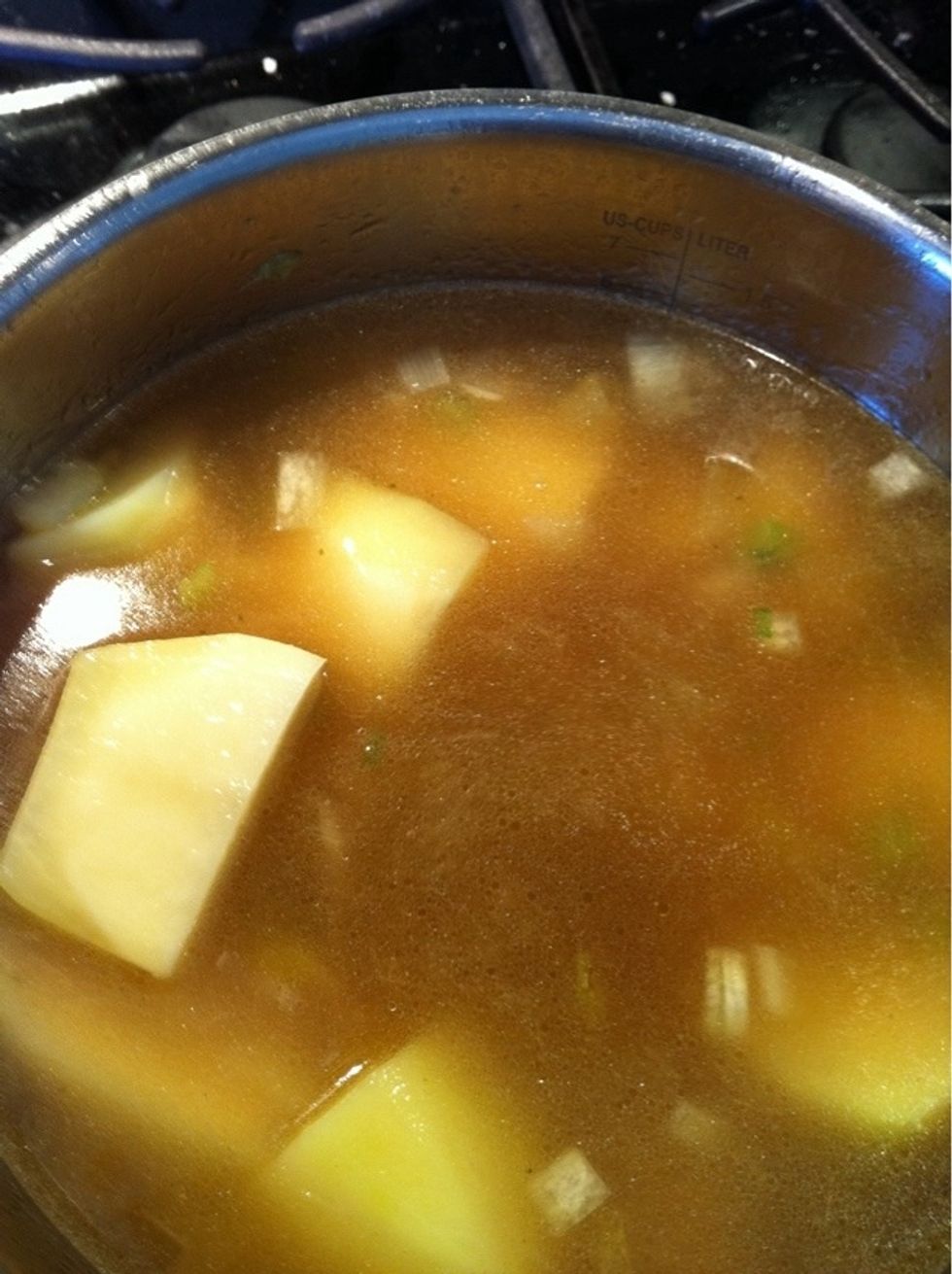 Add potatoes and stock. Bring to a boil and allow to simmer for 20 mins
