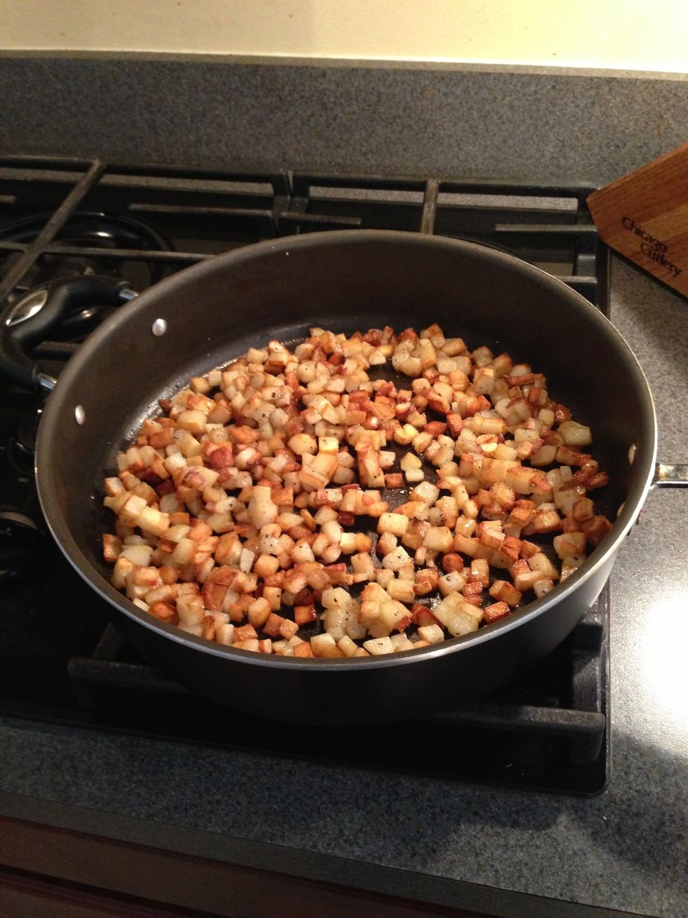 Add potatoes to preheated olive oil in skillet. Cook for about 10 minutes stiring frequently