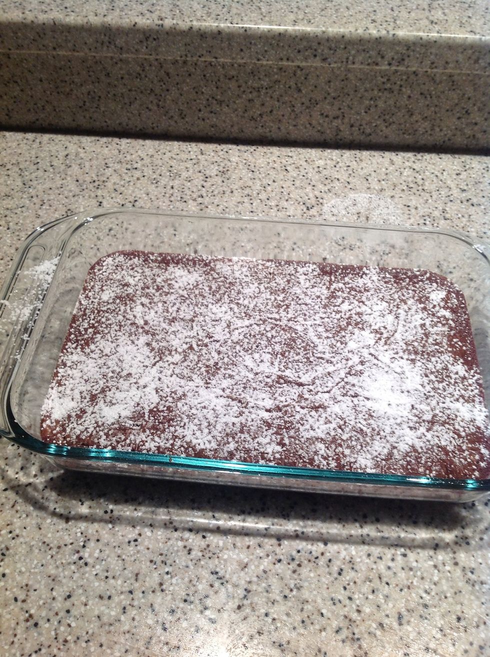 Add powder sugar on the top of the brownies.