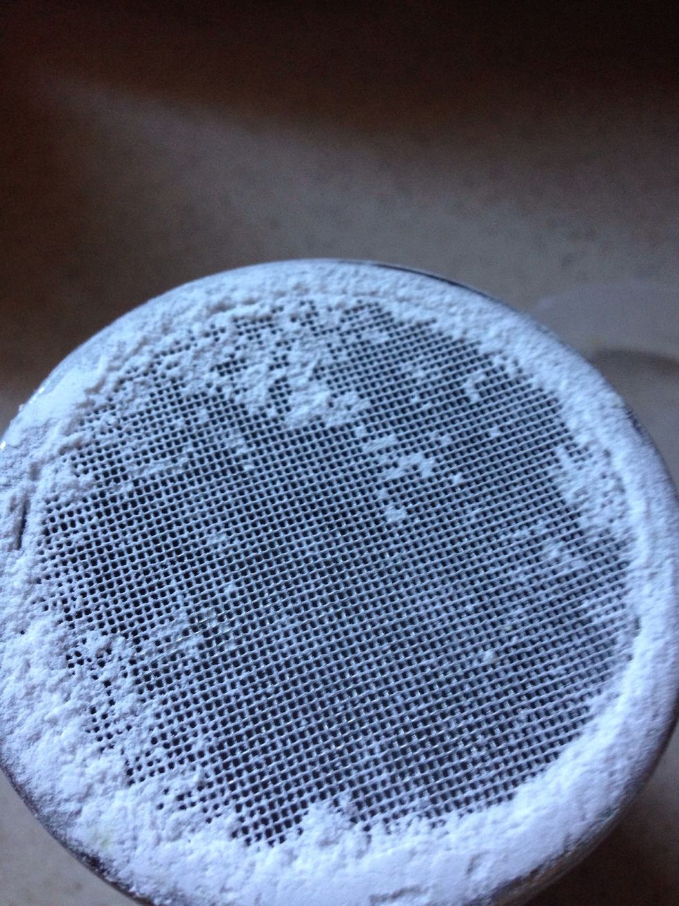 Add powdered sugar about 3 shakes. You don't need this if you don't want to.