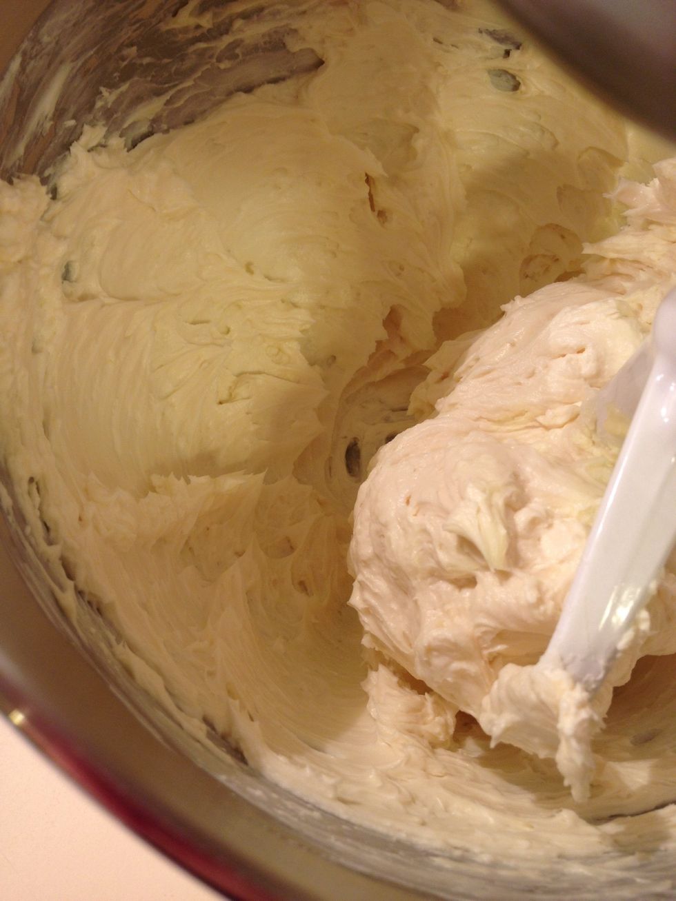 Add powdered sugar and mix slowly.