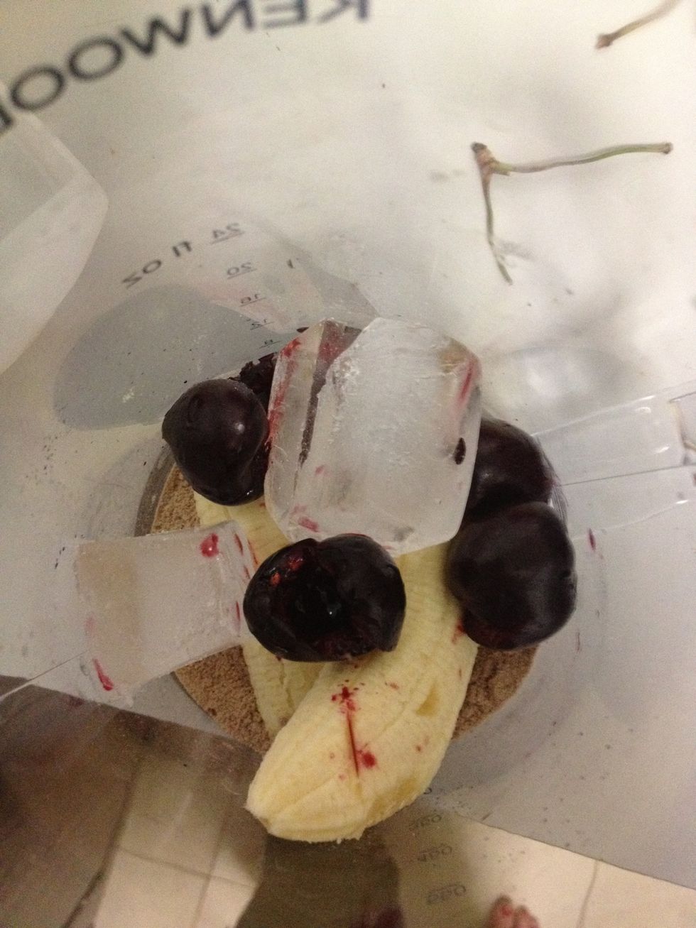 Add protein (mine is choc fudge flavour), a whole banana, pitted cherries and ice cubes to blender