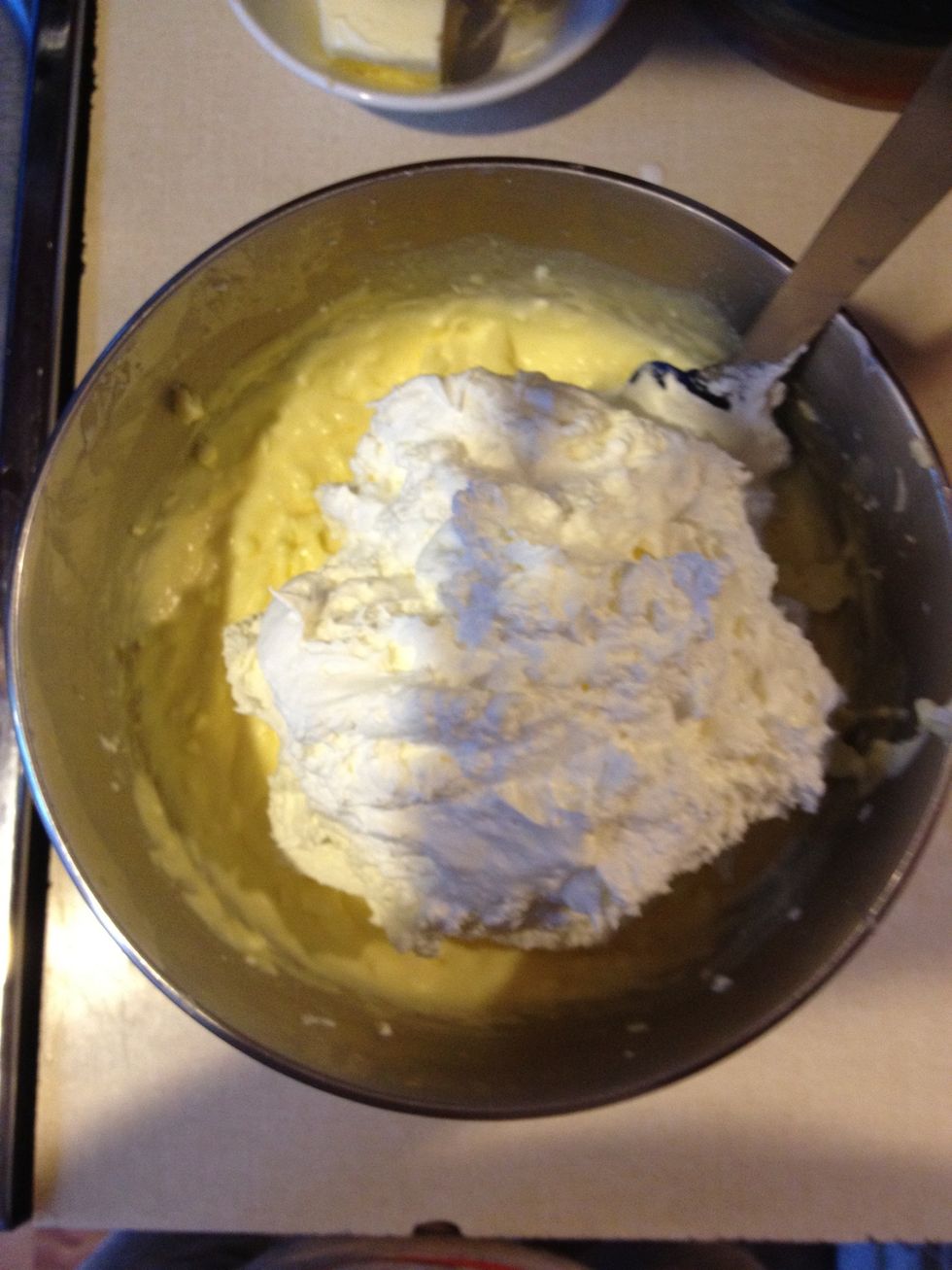 Add pudding to cheese mixture and blend together. Fold in Cool Whip.