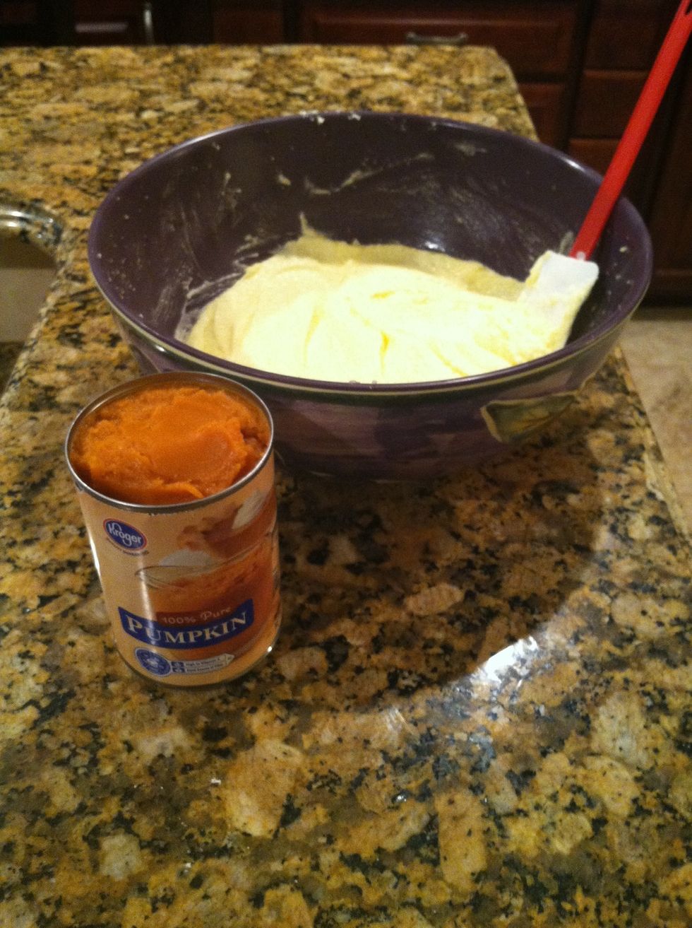 Add pumpkin and beat until combined , scraping down sides of bowl until just combined.