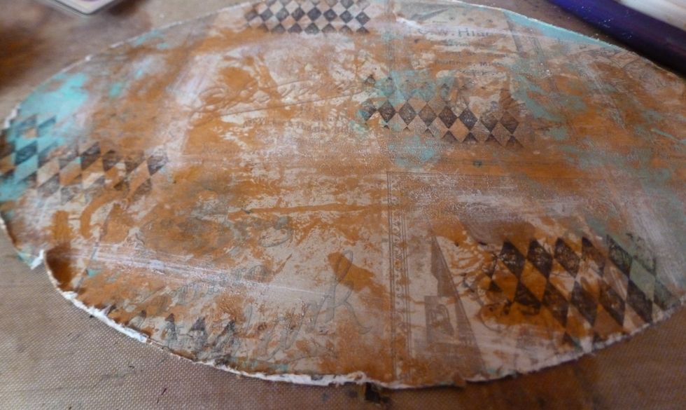 Add random stamping in black archival ink.