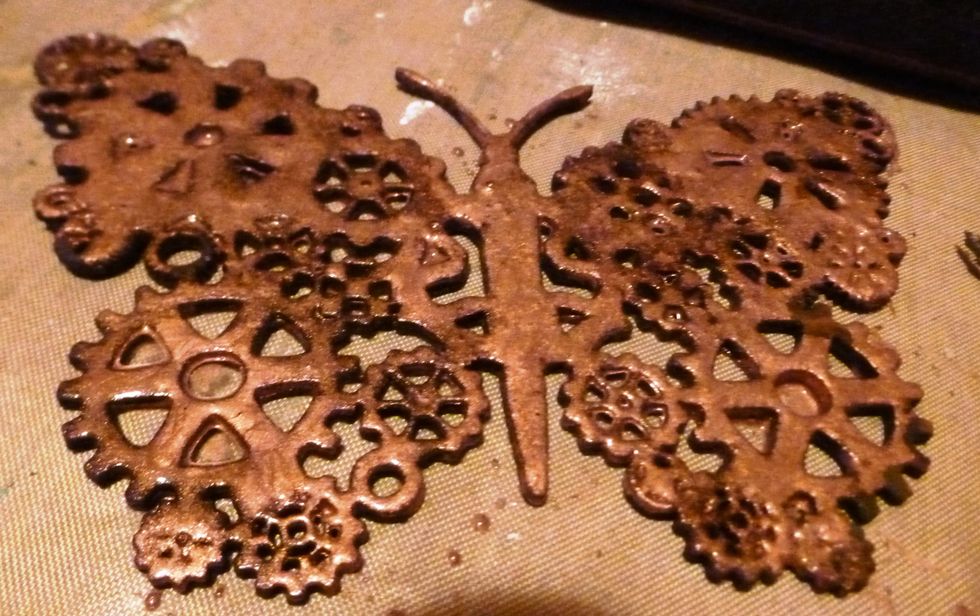 Add randomly Modern Masters Copper paint over the rusted areas. I like that it sinks into the rust and the effect it gives. Let dry.