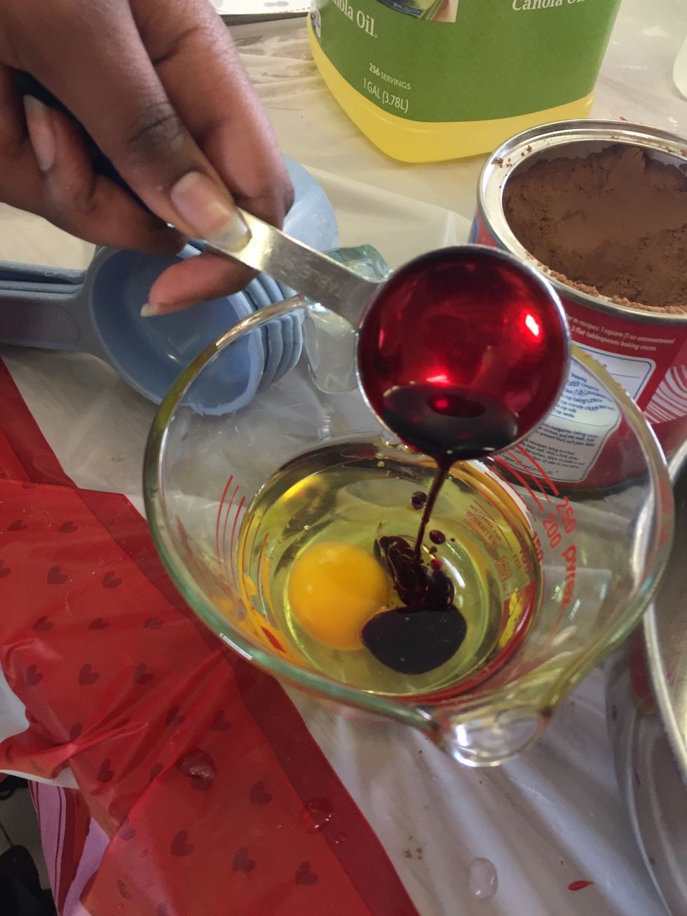 Add red food coloring to wet ingredients