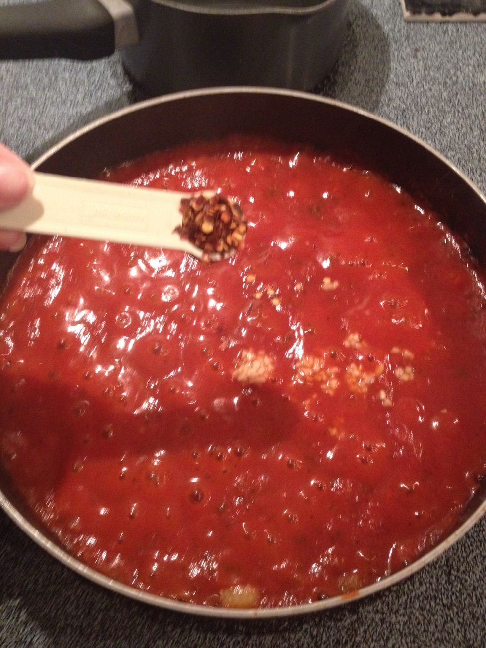 Add red pepper flakes. (Adjust amount to taste - less flakes if you don't like it spicy.)