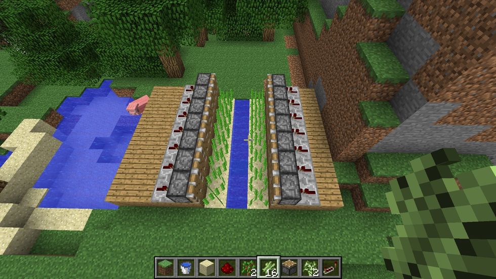 Add Redstone repeaters behind the pistons as shown.