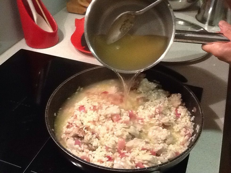 Add remaining chicken stock. Stir. Simmer, covered with a lid until rice is tender but not soggy.