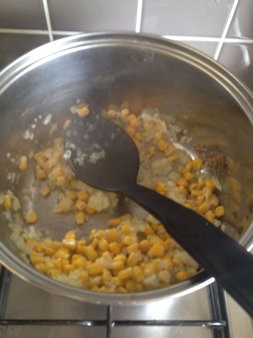 Add rest of onion n garlic to pan and add 1 cup of corn kernals