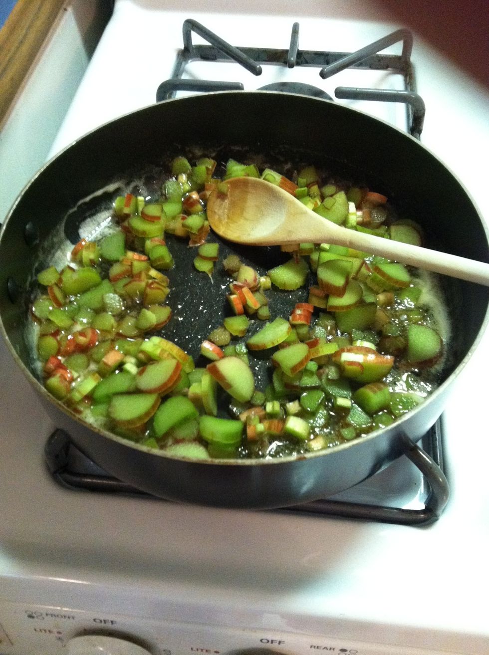 Add rhubarb. Stir frequently, keep at medium heat for 3-4 minutes until rhubarb cooks down.