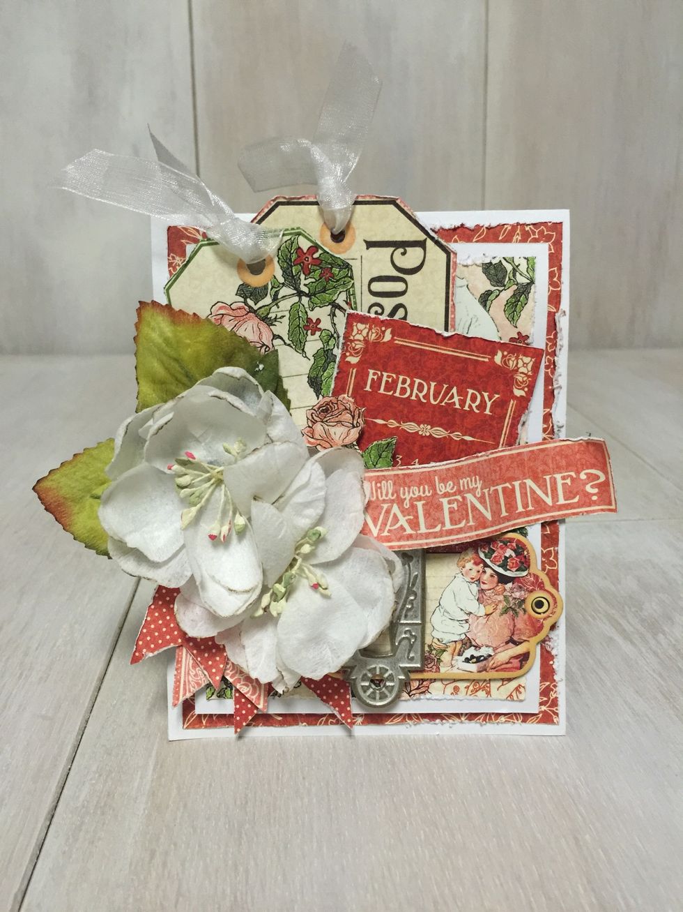 Add ribbon to your tags of you didn't earlier. And, now present your gorgeous card to your Valentine!