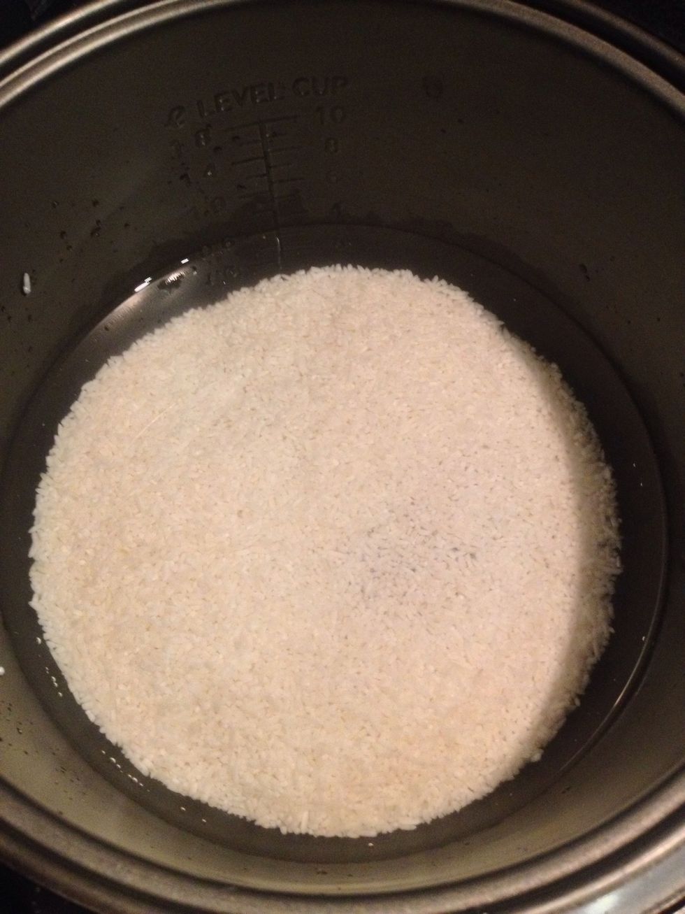 Add rice and water 1 cup of rice to 3 cups of water