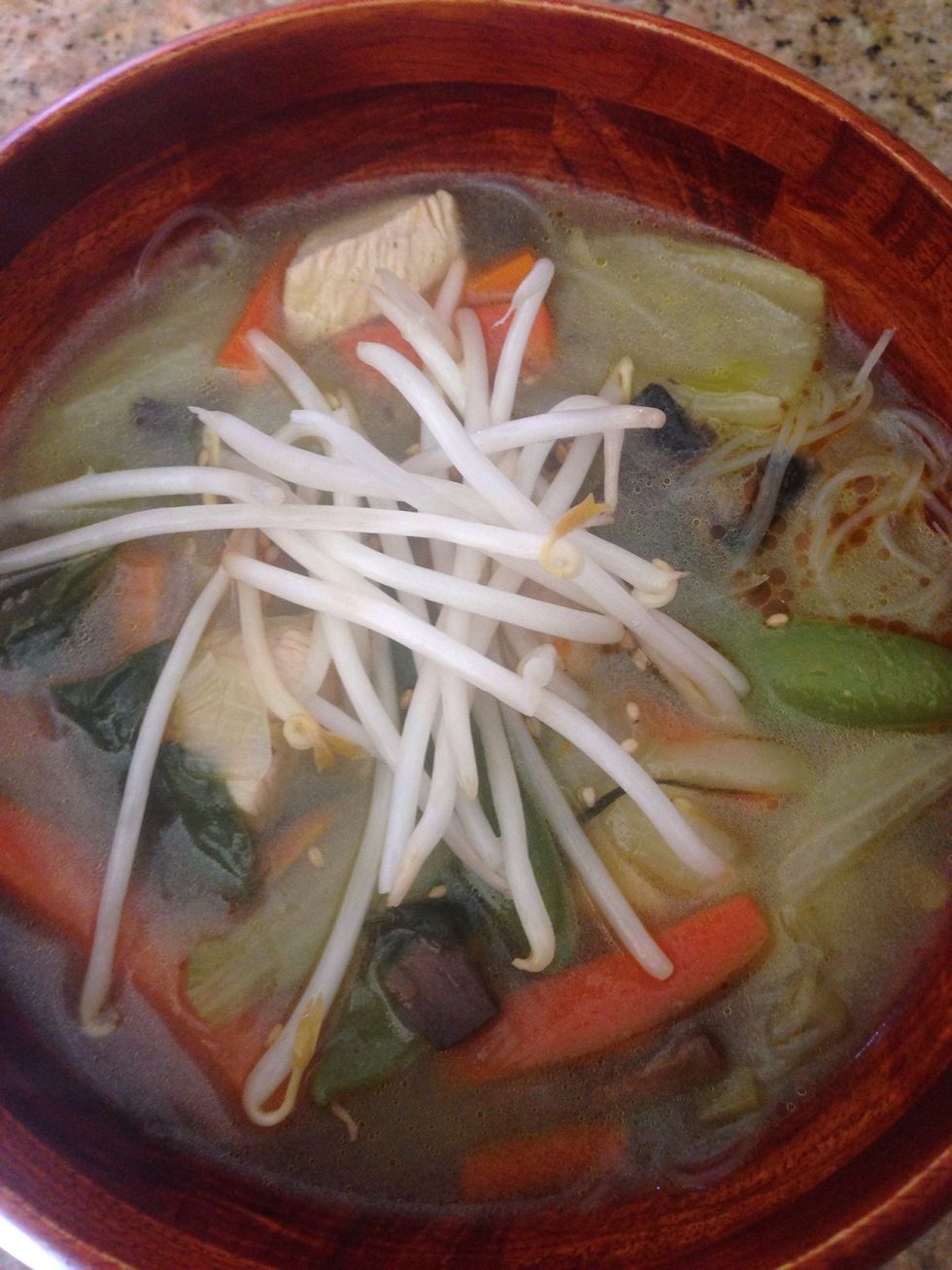 Add rice noodles to individual bowls. Then scoop soup on top. Add any extras on top (sesame seeds, chili oil, green onions, siracha).