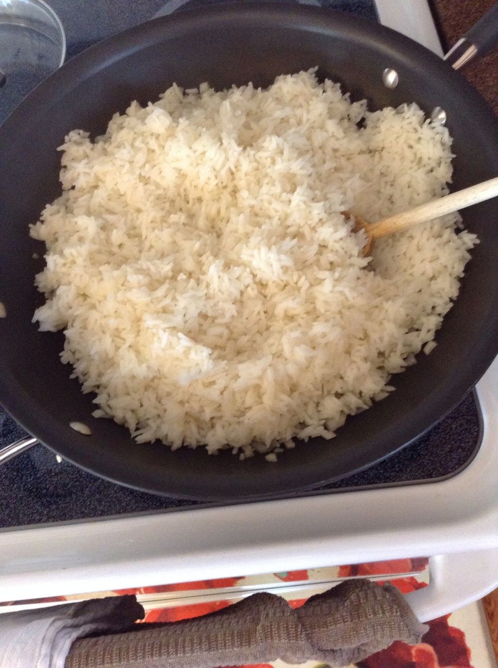 Add rice, stir