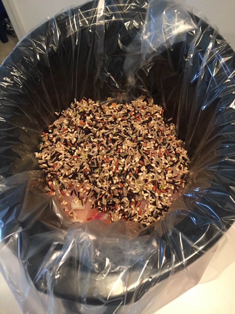 Add rice to crockpot.