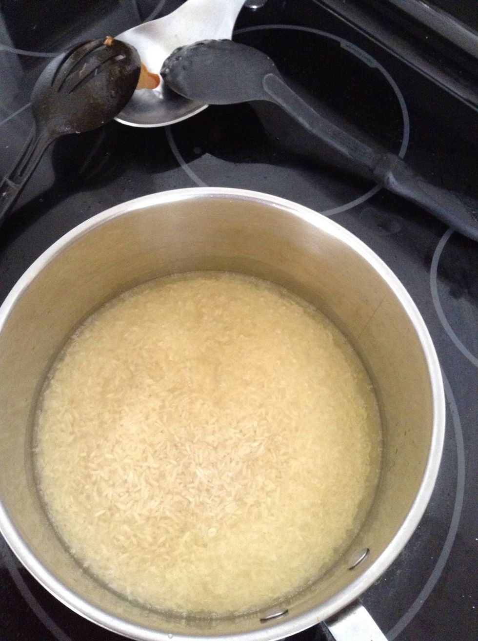 Add rice to hot oil...cook until brown.