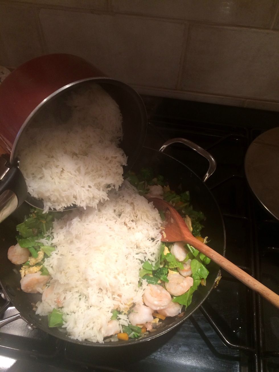 Add rice to rest of pan