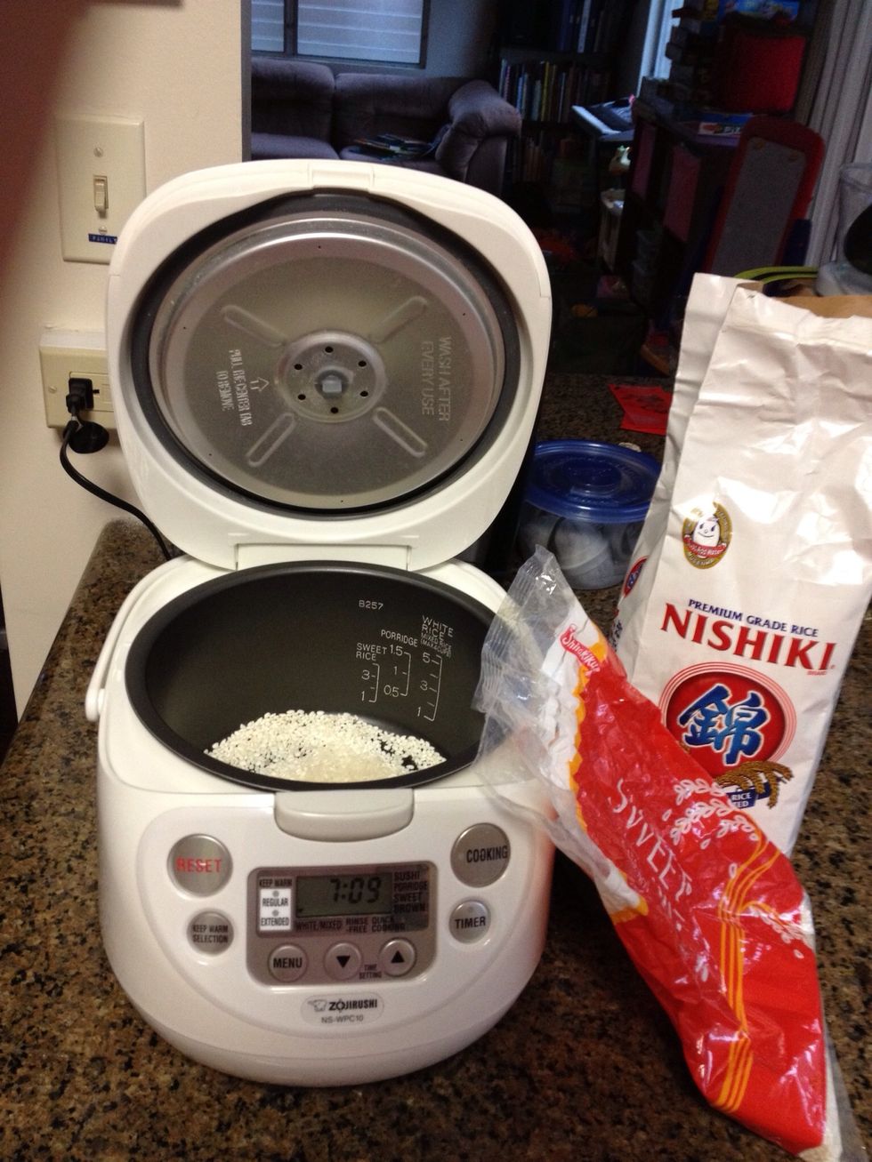 Add rice to rice cooker.