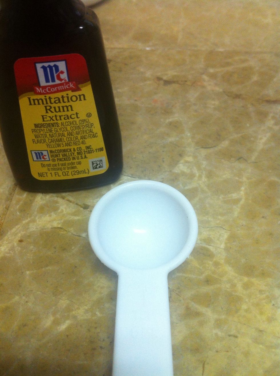 Add rum extract... ONLY 2 TEASPOONS!!!!! The other teaspoon is for the creme on top! :)