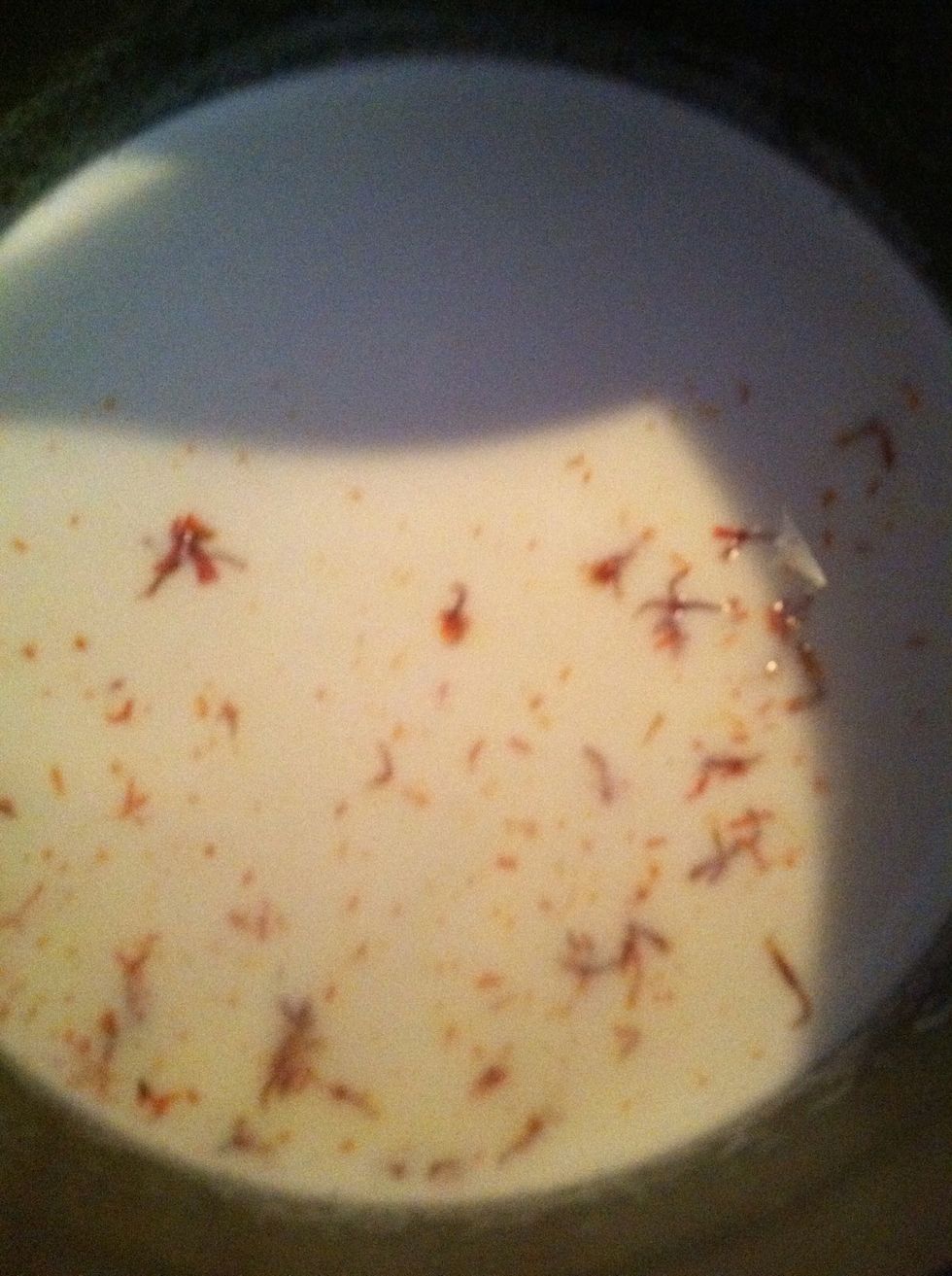 Add saffron to mixture  (trick i use , take some sugar and saffron,spoon, and grind  it to bring out color and flavor more)