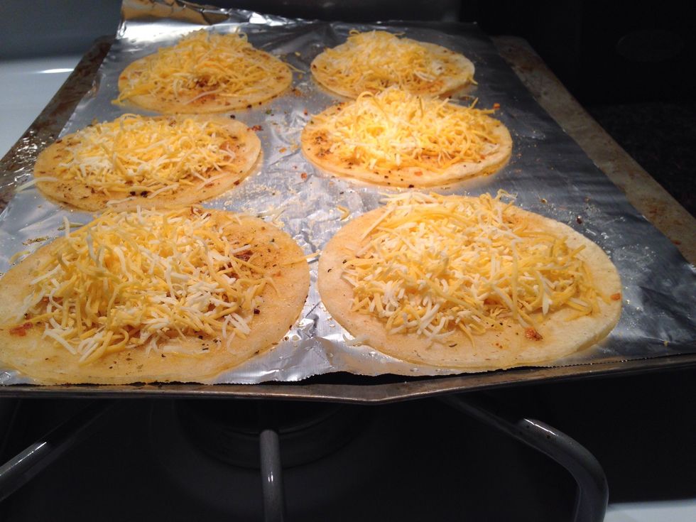 Add salsa and Mexican cheese. Top it off with a sprinkle of the Queso Cotija cheese and bake at 350\u00b0F for 8 minutes.
