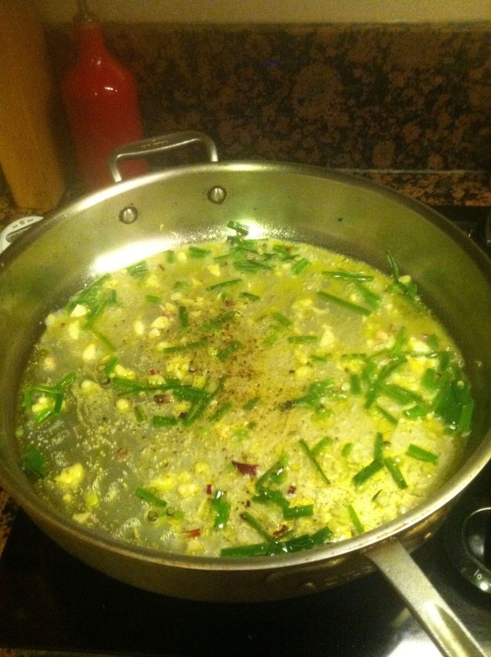 Add salt and a few grinds of pepper, and turn up the heat to bring it to a boil.